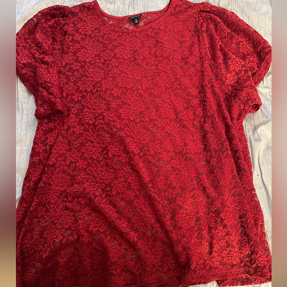Torrid red lace see through short sleeve top. Slight puff in the sleeve